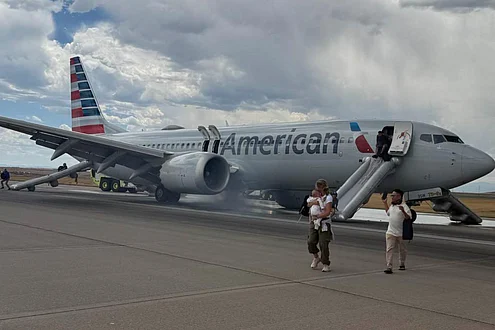 Watch: Passengers evacuated from American Airlines plane on runway after ...