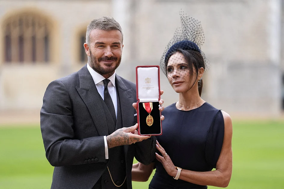 Football star David Beckham receives knighthood from King Charles at ...