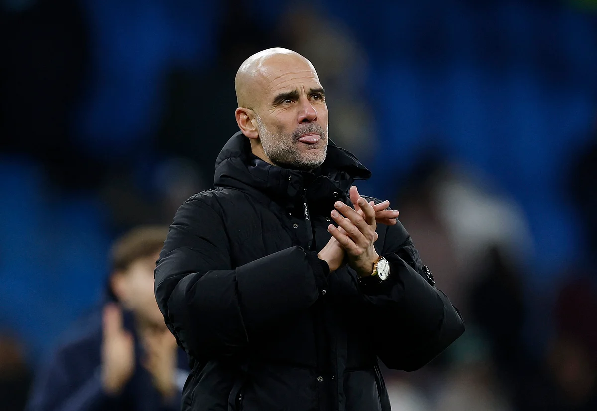 Guardiola downplays trophy talk as he focuses on Manchester City growth