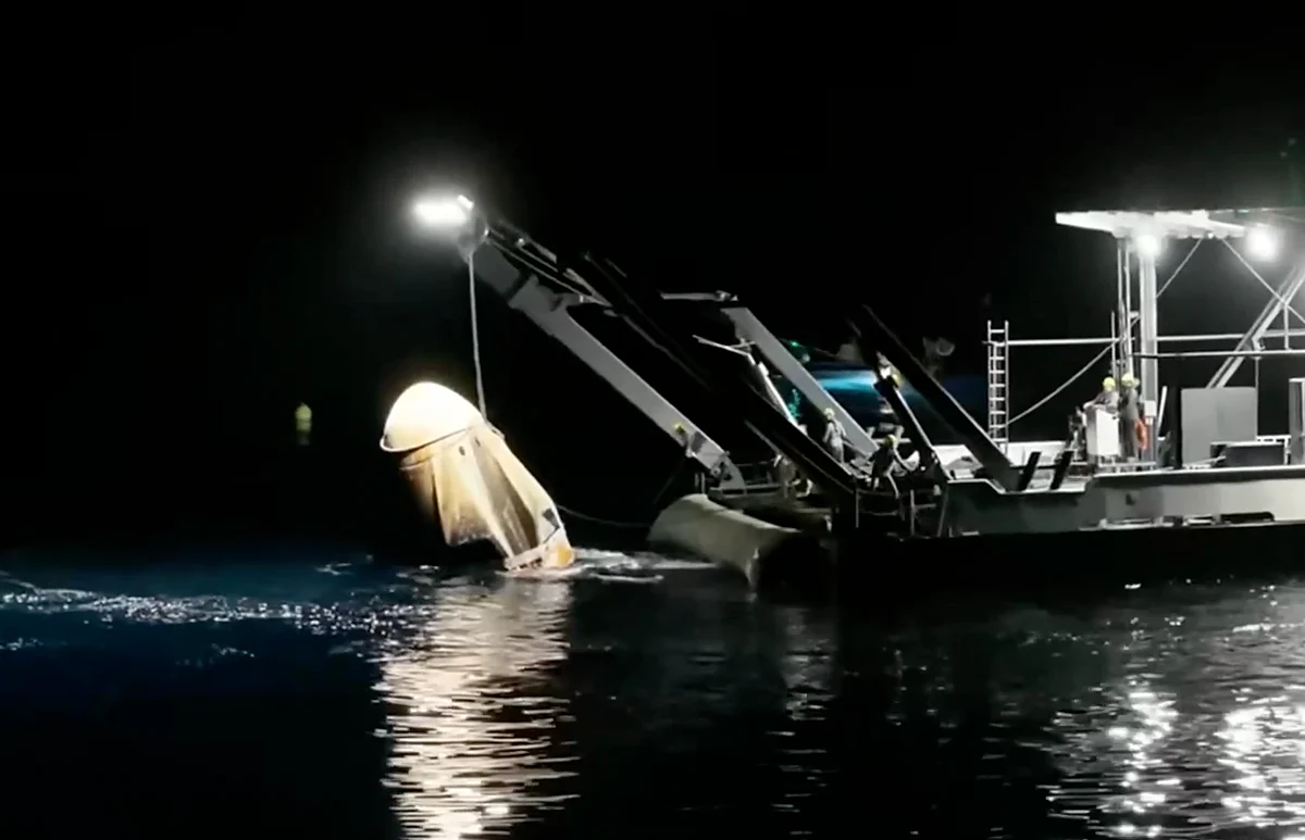 Nasa astronauts splash down on Earth after first-ever medical evacuation from ISS