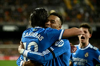 Real Madrid edge Valencia to stay on Barca's tail, Atletico slump