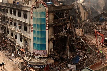 Deadly Karachi mall fire started in artificial flower shop, witnesses tell court