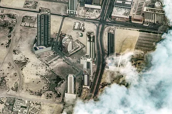 Kuwait airport, Bahrain desalination unit struck as Iran presses Gulf attacks