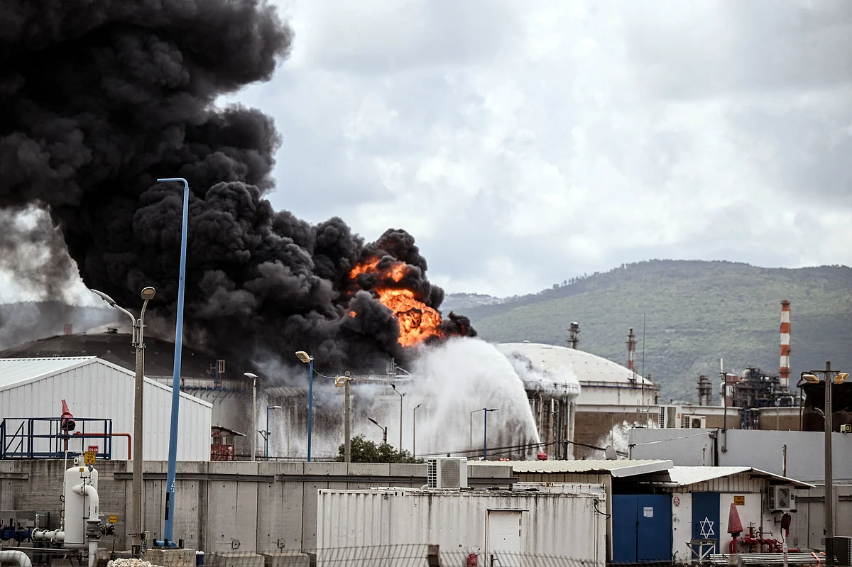 A blaze after Israel's Fire and Rescue Service said that an industrial building and a fuel tanker at Israel's Oil Refineries were hit by debris from an intercepted Iranian missile, amid the U.S.-Israel conflict with Iran, in Haifa, Israel March 30, 2026. REUTERS/Rami Shlush ISRAEL OUT NO COMMERCIAL OR EDITORIAL SALES IN ISRAEL