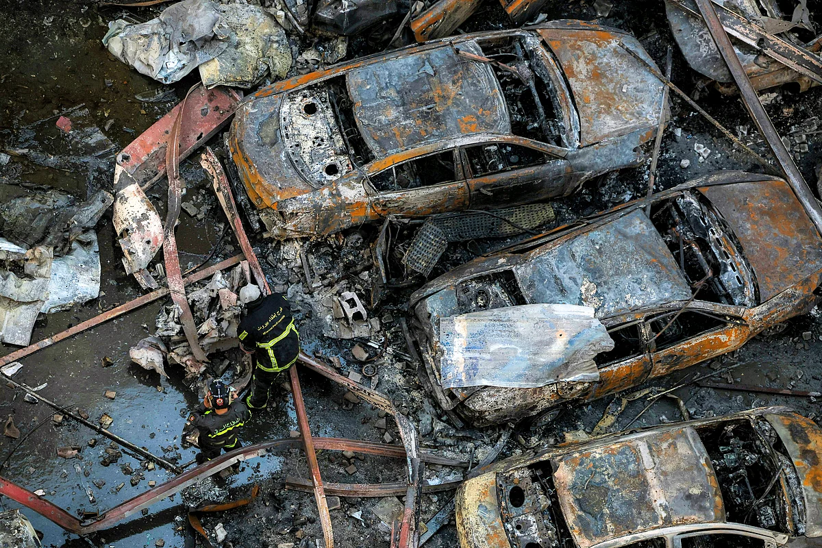 Firefighters attempt to extinguish a fire following an Israeli strike at the Corniche al-Mazraa neighbourhood of Beirut on April 8, 2026.