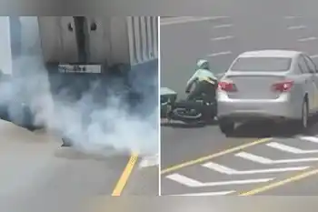 Watch: Delivery rider gets knocked down by driver; police warn against sudden swerving