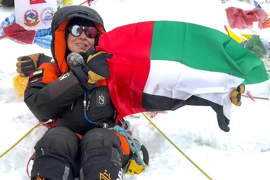 Years after head injury, Dubai banker summits Everest, raises UAE flag