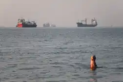 Iran says 2 ships hit in Hormuz, US Fifth fleet targeted in Bahrain