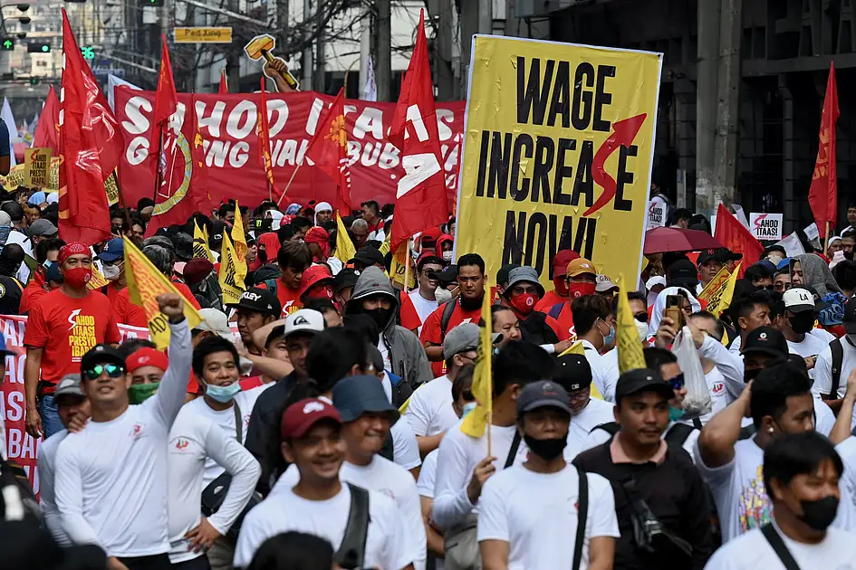 Filipino workers say P85 daily wage hike in Manila inadequate as living ...