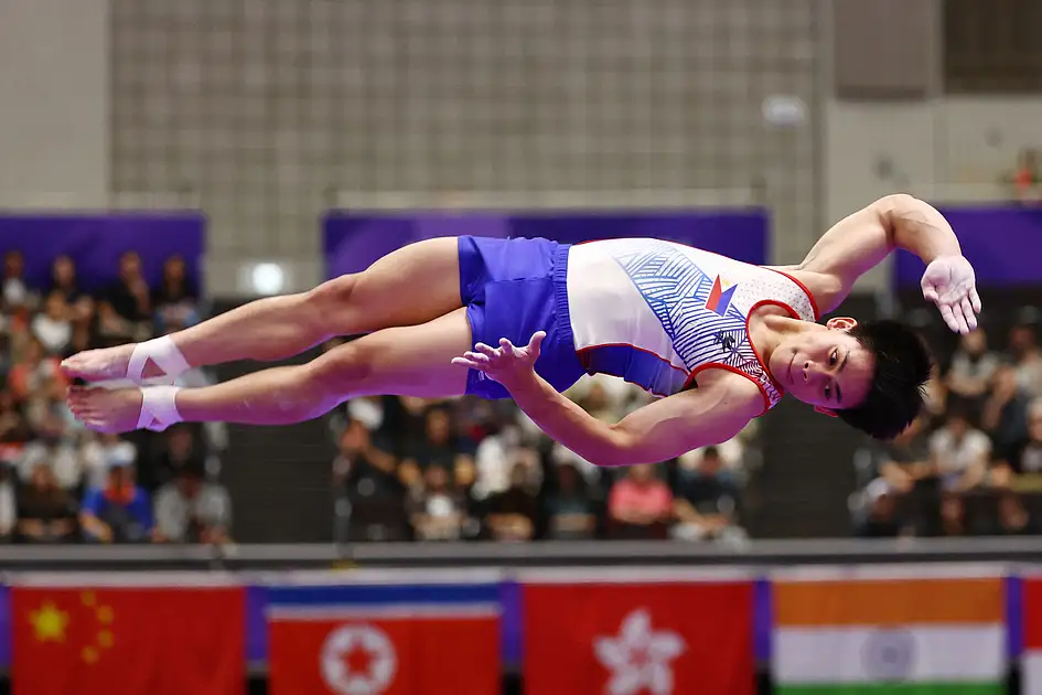 Japan teen smashes swim world record as Yulo grabs gold