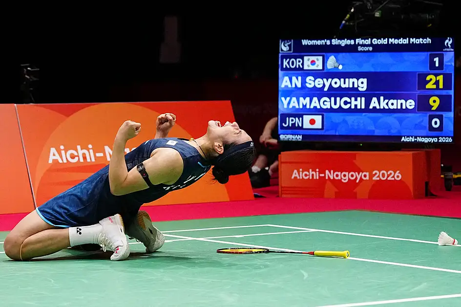 Cricket washed out as badminton queen An reigns over Asian Games