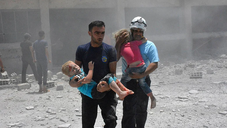 Israel evacuates White Helmets | Khaleej Times