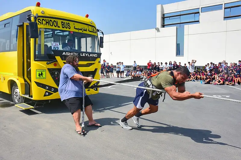 Bus Pulling Strongman pulls 9-tonne school bus in Dubai | Khaleej Times