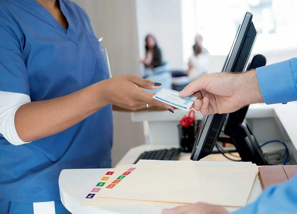 Dubai health and immigration officials signing a strategic agreement