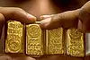 Gold falls to two-week low as Fed rate fears eclipse peace dividend