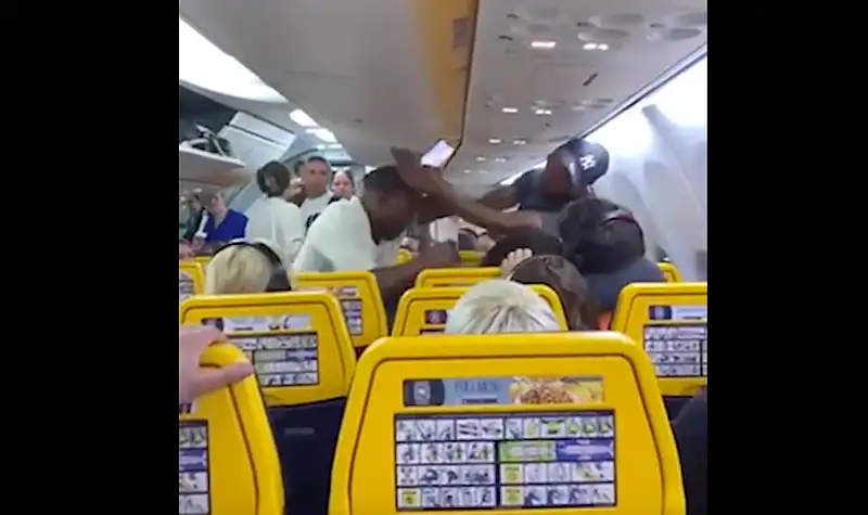 Window Fight 2 men break into fight over window seat; fellow passengers step in to ...
