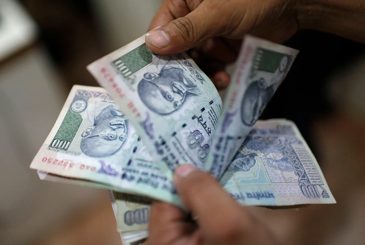 Despite resilience, Indian rupee likely to hit 89 per dollar by year ...