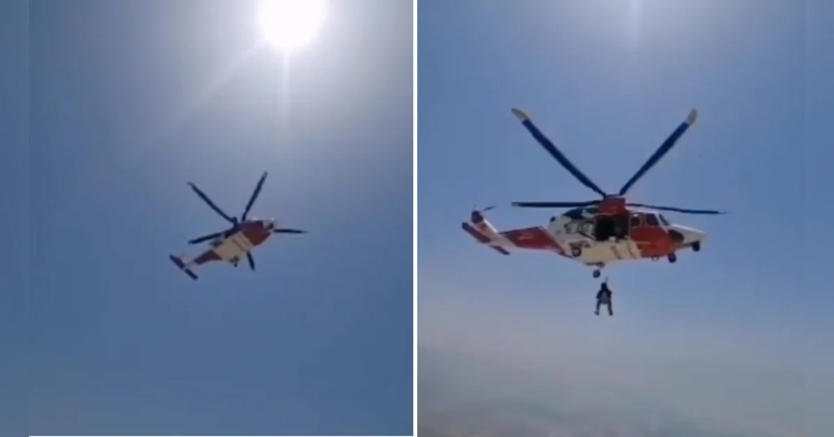 Watch: Helicopter airlifts injured man after he falls from mountain in ...