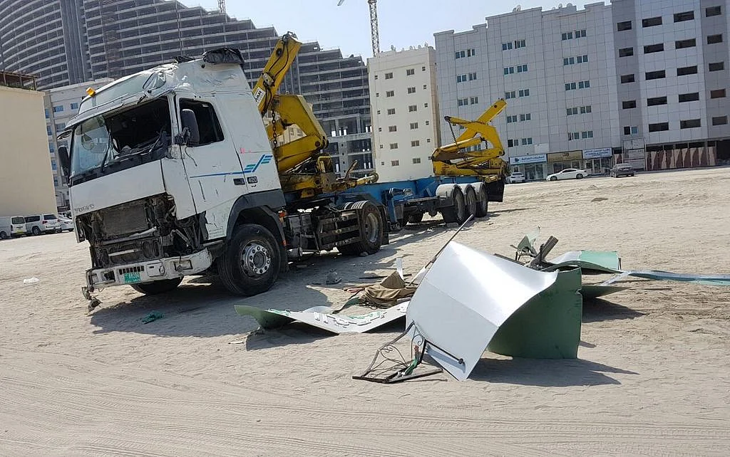 Four hurt as truck crashes into Sharjah building | Khaleej Times