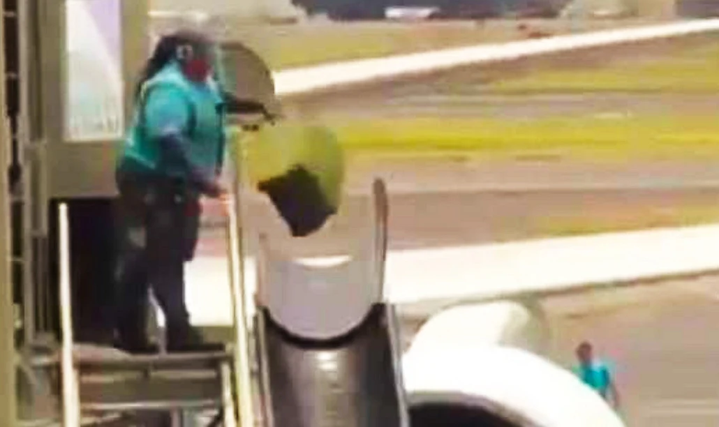 Video: Baggage handler caught carelessly throwing luggage at airport ...