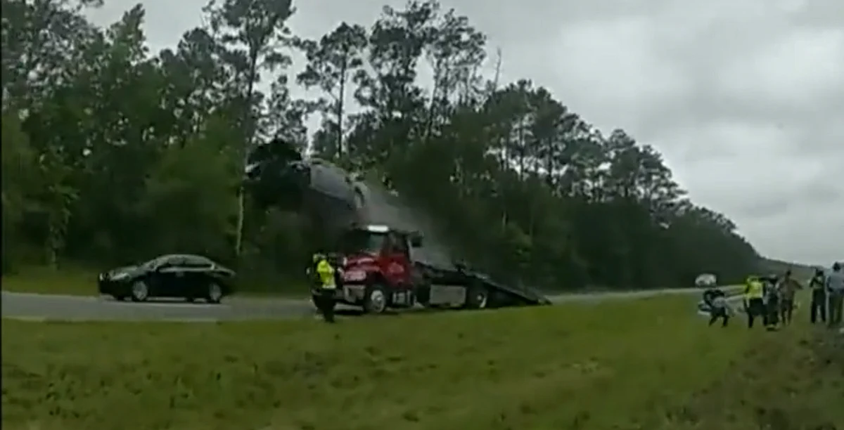 Viral video: Speeding car flies off tow truck's ramp in shocking ...